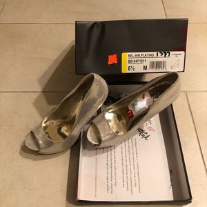 Carlos Santana Metallic Pumps